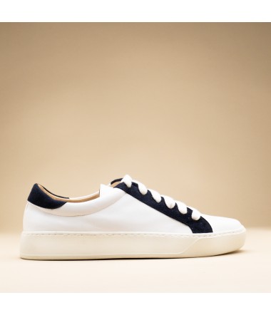 woman navy and white leather sneakers