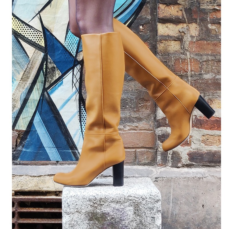 Woman beige leather knee high boots